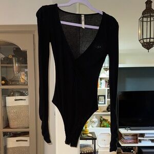 Black Free People Ribbed Long Sleeve Bodysuit
